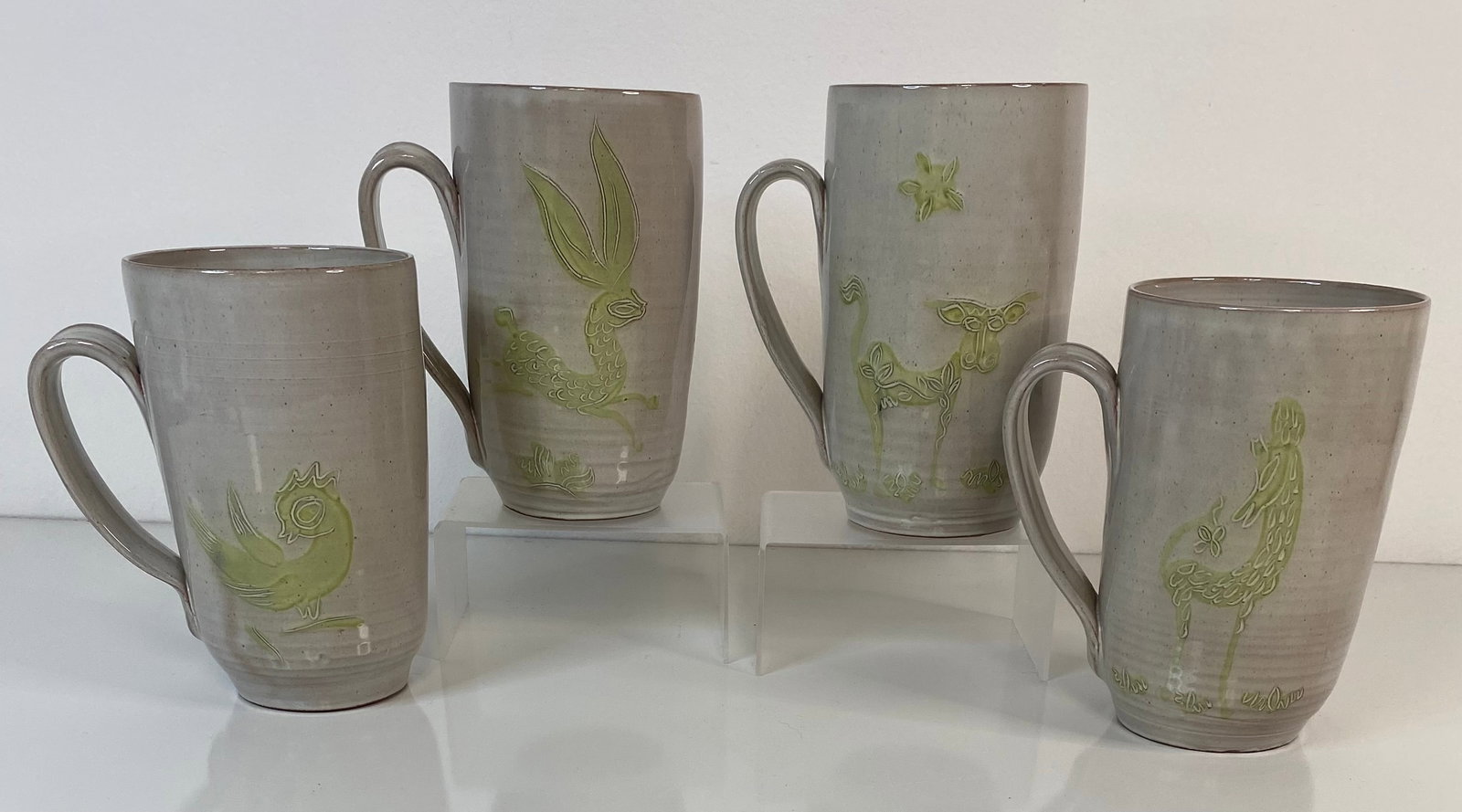 Scheier Pottery Mug Set: This lot is comprised of 4 different animals in the Scheier Style . 5 1/2" tall