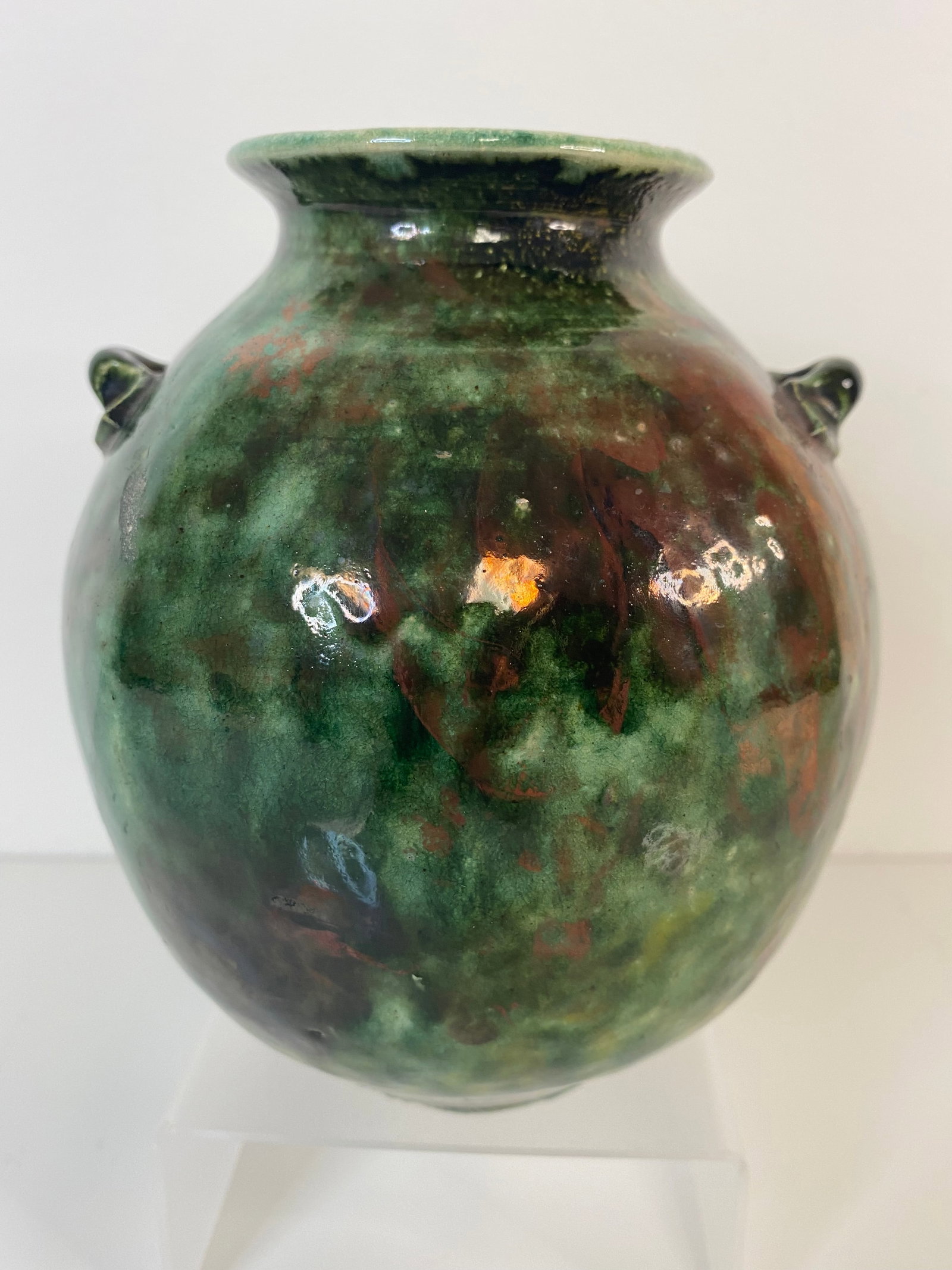 Richard Rohlander MN Pottery: This artist has exhibited at the Tweed Museum and Macalster College. Very nice iridescent glaze, 6" tall