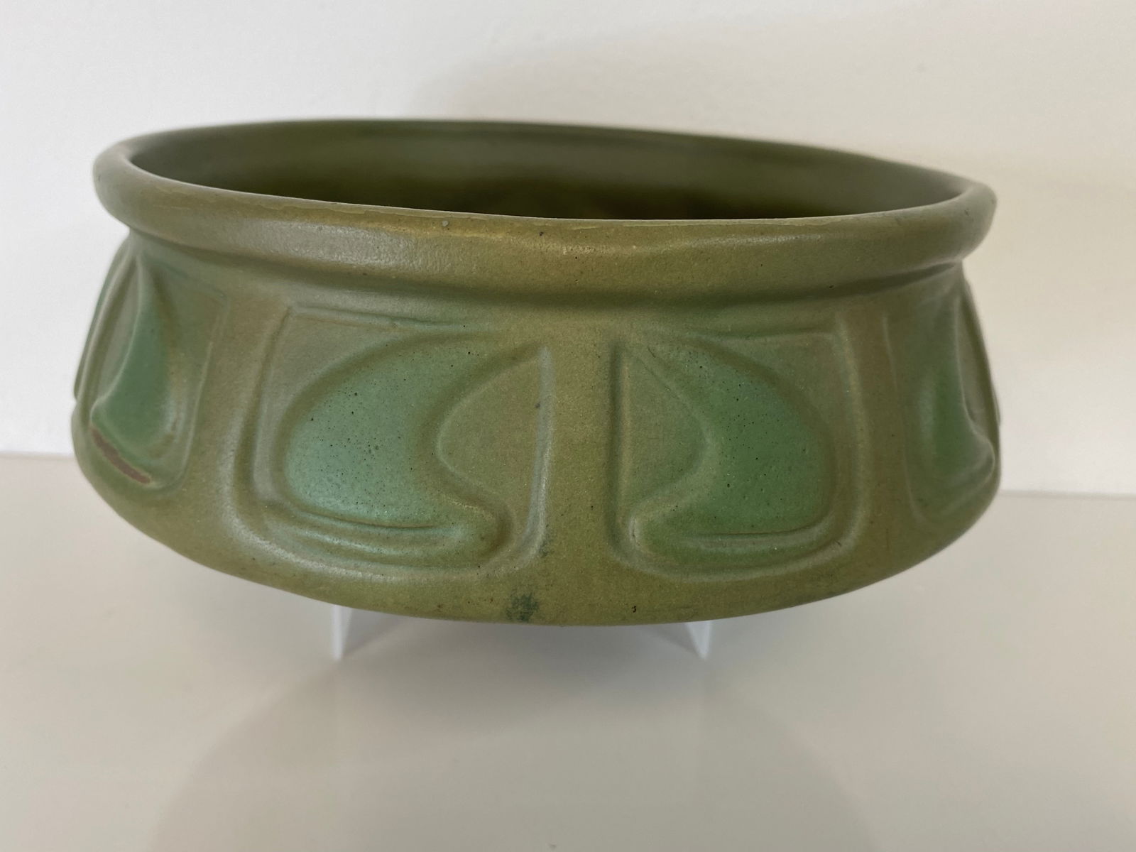 Van Briggle Pottery: This low bowl has a geometric desgin and measure 8 1/2" wide. I believe this is in the teens.
