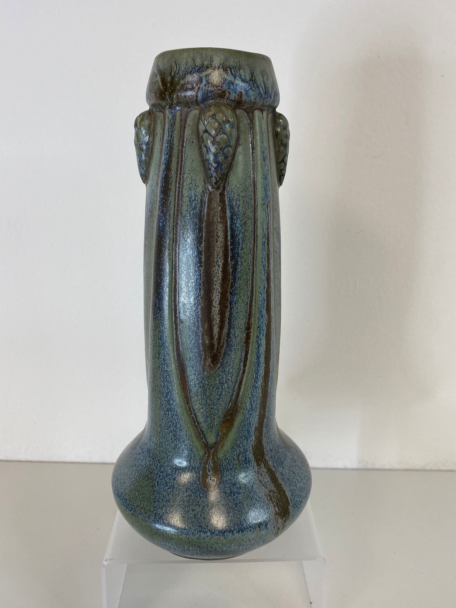 Denbac Pottery: measuring 8 3/4" tall this vase has a nice decoration of pinecones . Denbac has a very nice reputation for glazes