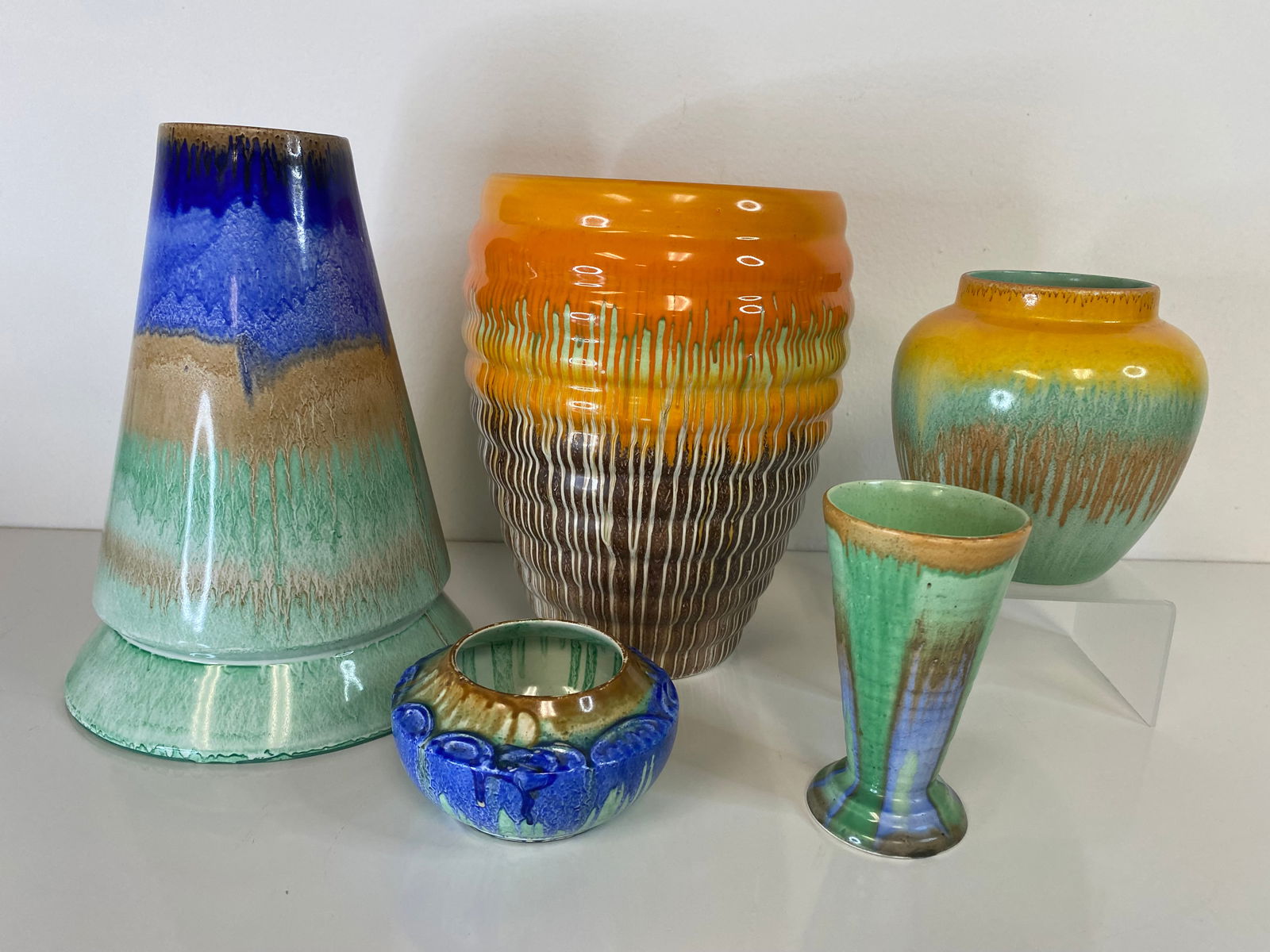 Shelley England grouping dripware: 5 pieces in this very colorful lot. All are marked with the Shelley stamp. Largest is the cone form at 8" tall