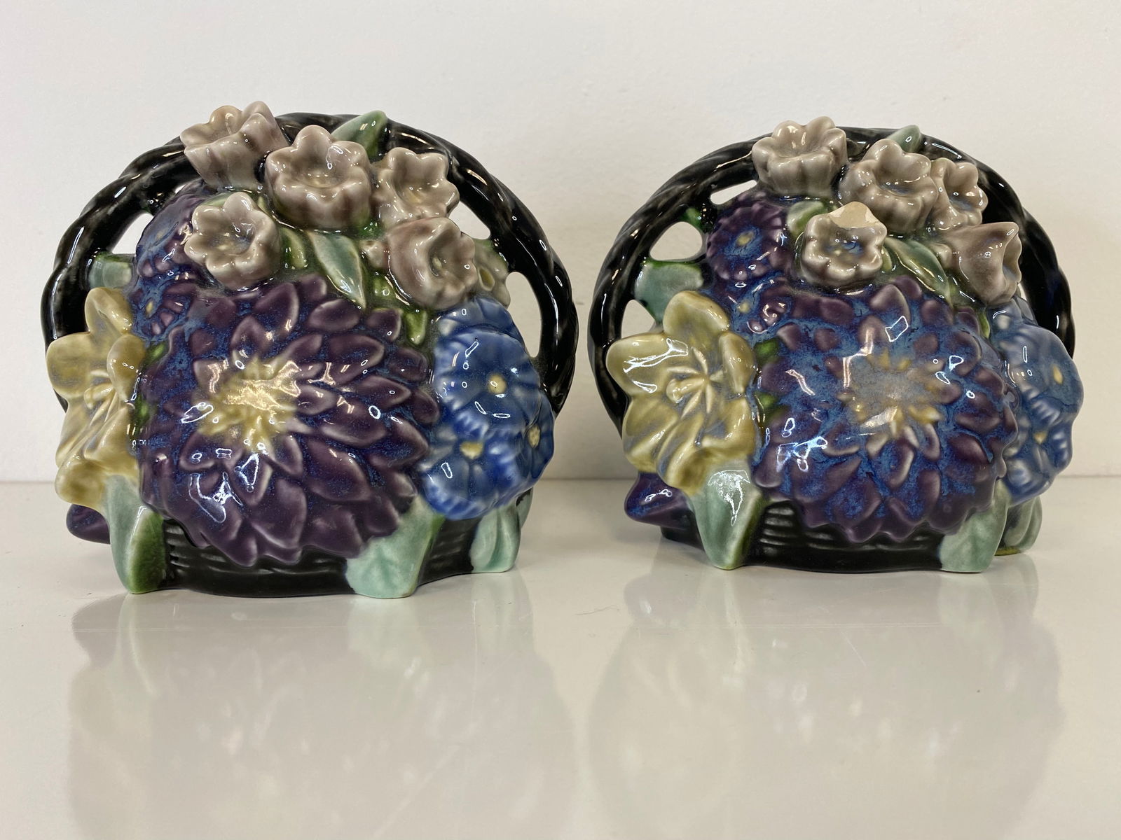 Rookwood Pottery Bookends: made n 1929 these multi colored bookends of a flower basket measure about 5" tall