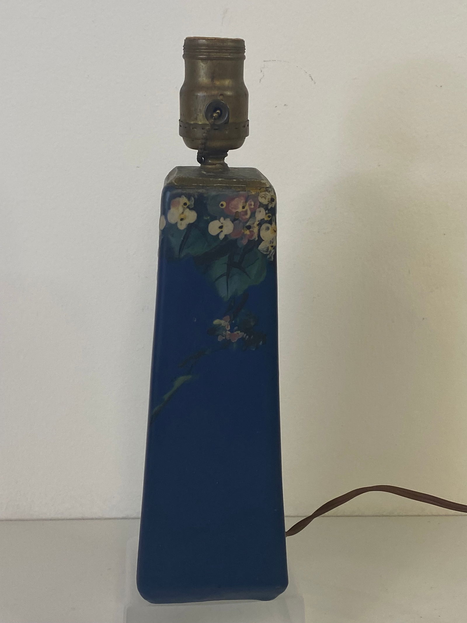 Weller Pottery Hudson: Blue hudson that has been filled with plaster to make sure it wouldn’t tip. Pottery portion 9 1/2" tall