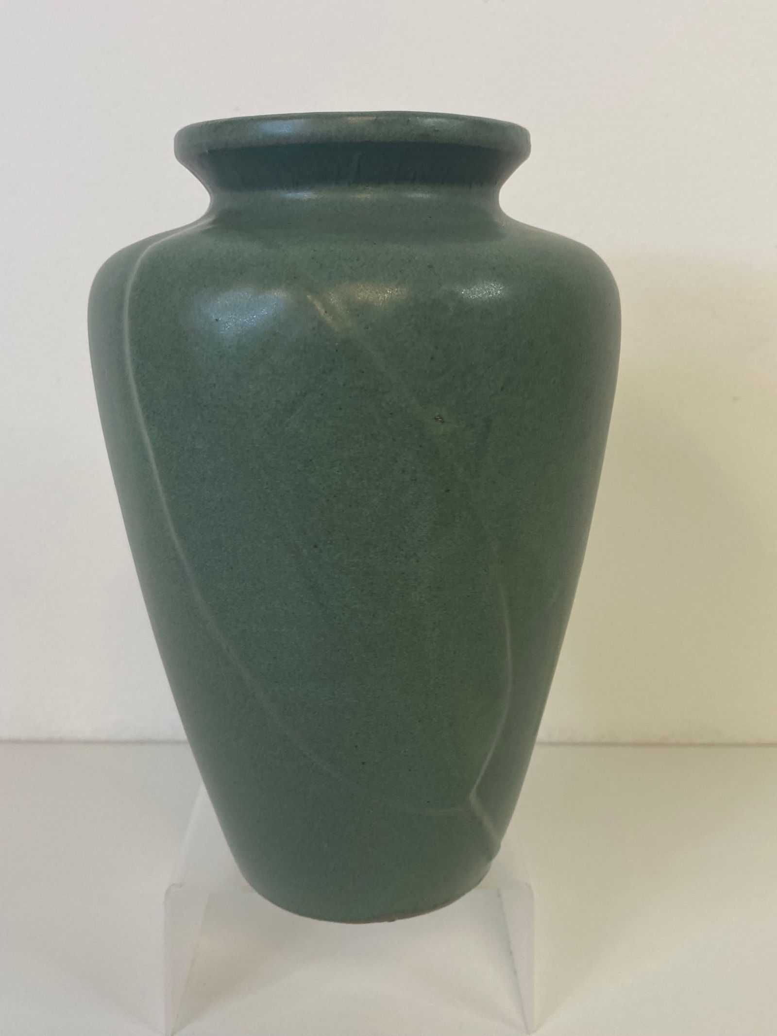 Zanesville Pottery: matte Green vase with fern leaf measuring 8" tall