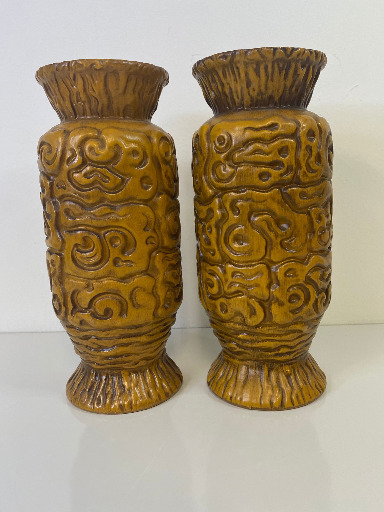 Pair Haeger Pottery Tiki: Nice orangish brown vases at 12" tall