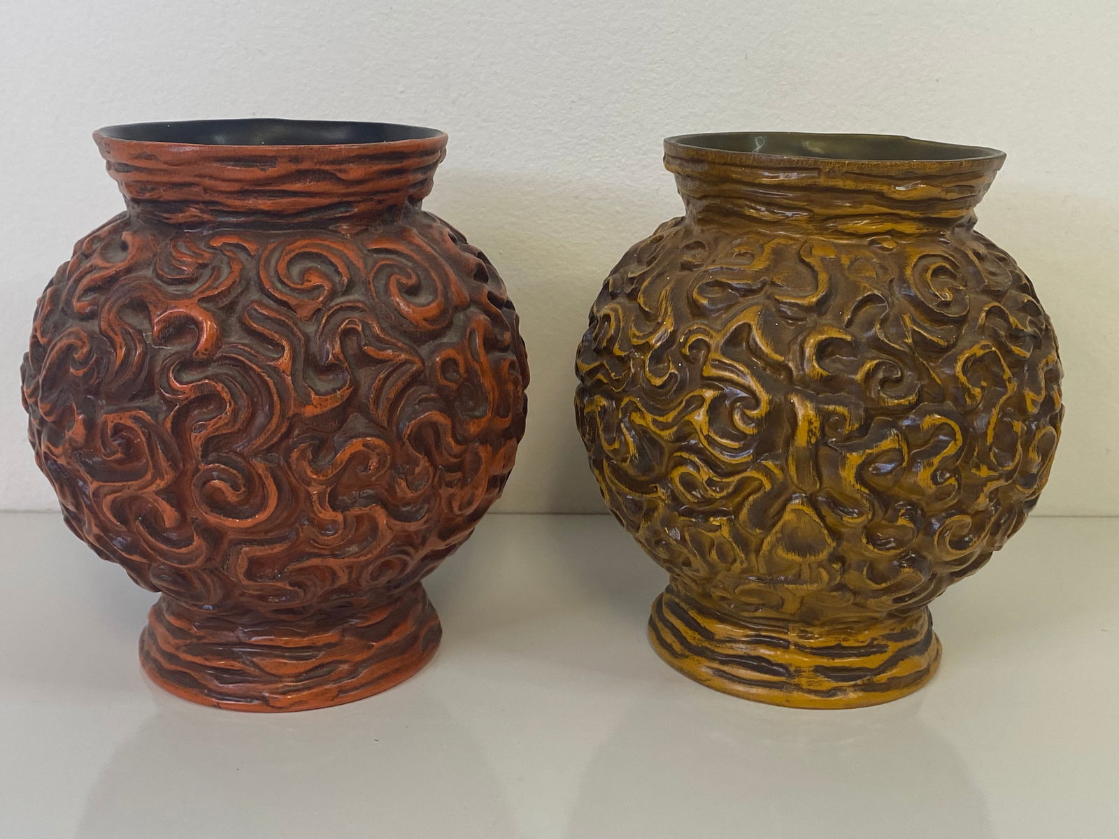 Pair Haeger Pottery Tiki: Squattier ball form these measure7" tall. I orange and one red