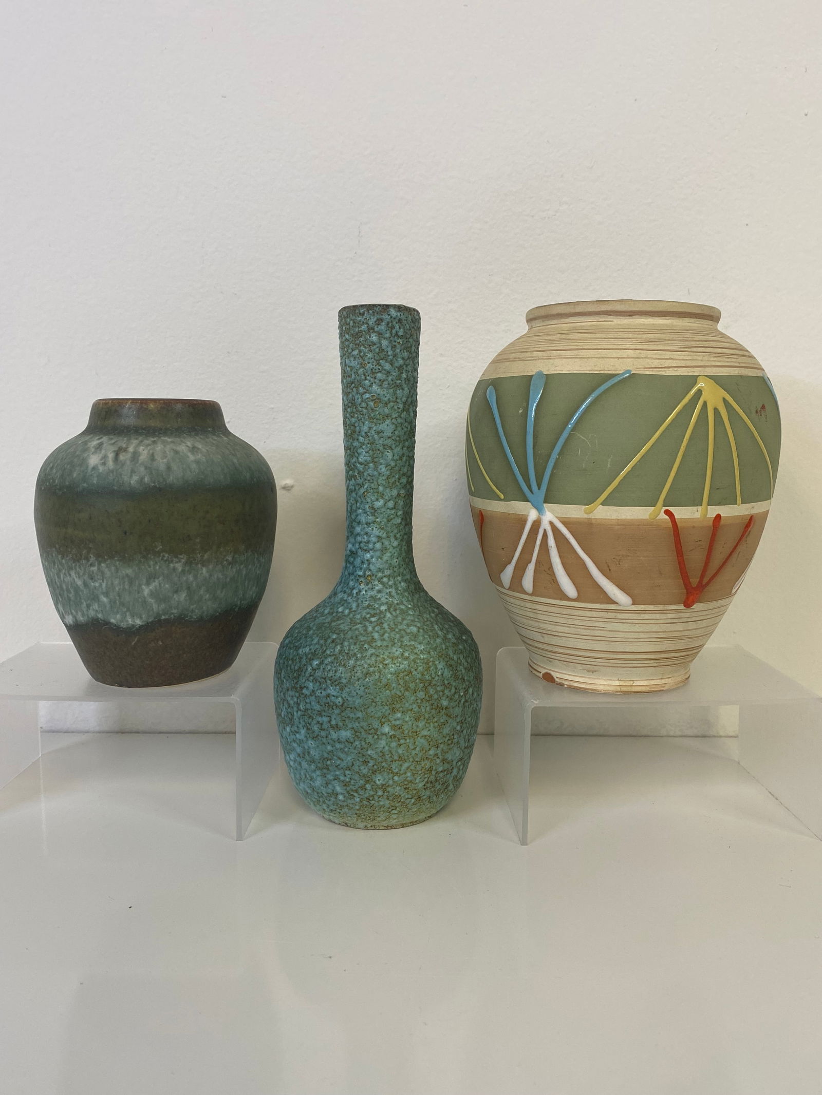 3 pcs West Germany Pottery: Tallest is the robins egg blue speckled vase at 7 1/4" along with a geometric design vase and a cabinet vase