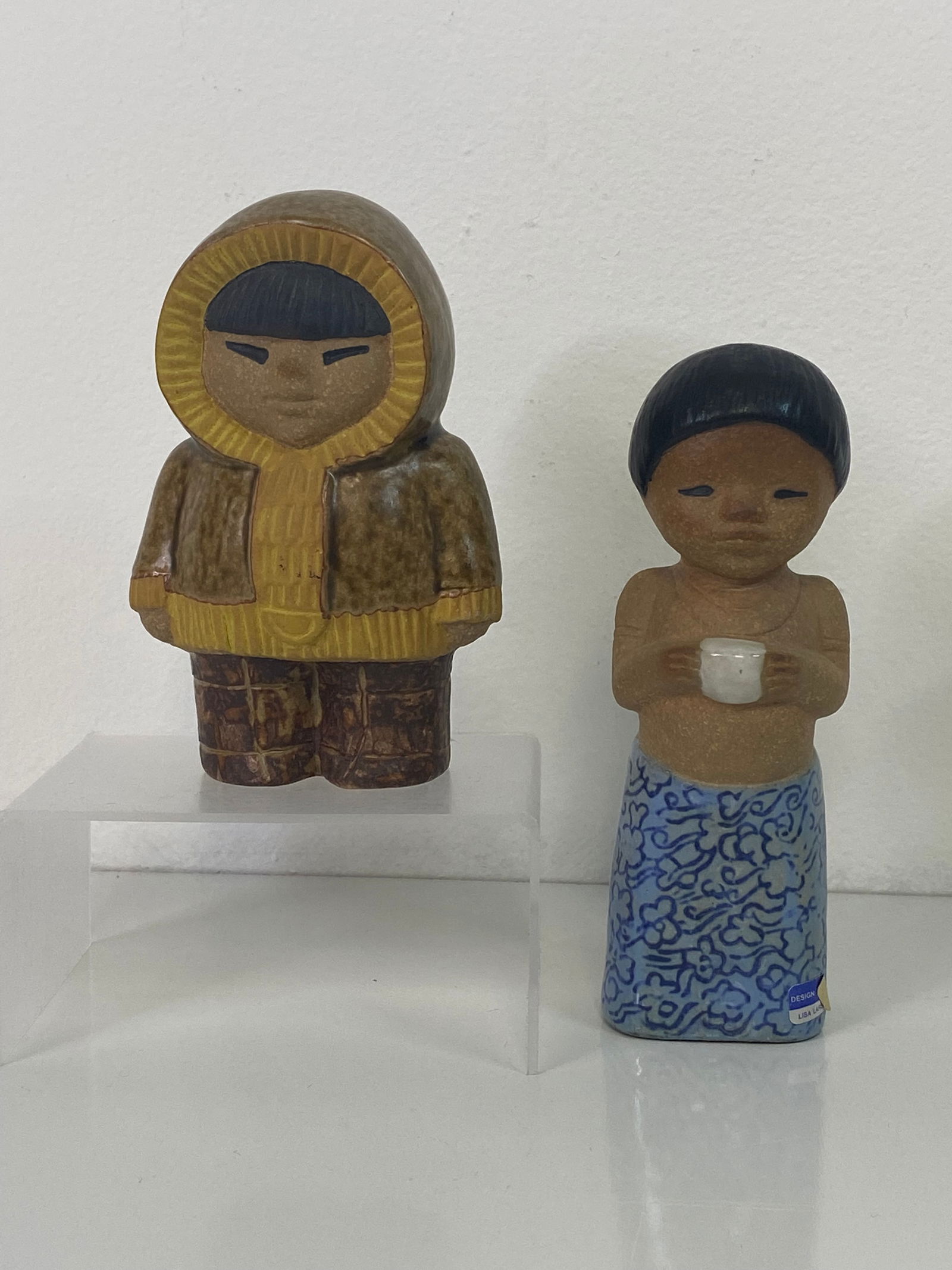 2 pcs Lisa Larson for Gustavberg Sweden: Eskimo and Girl Holding cup tallest at about 5 1/2" tall with partial label and eskimo child is 5"