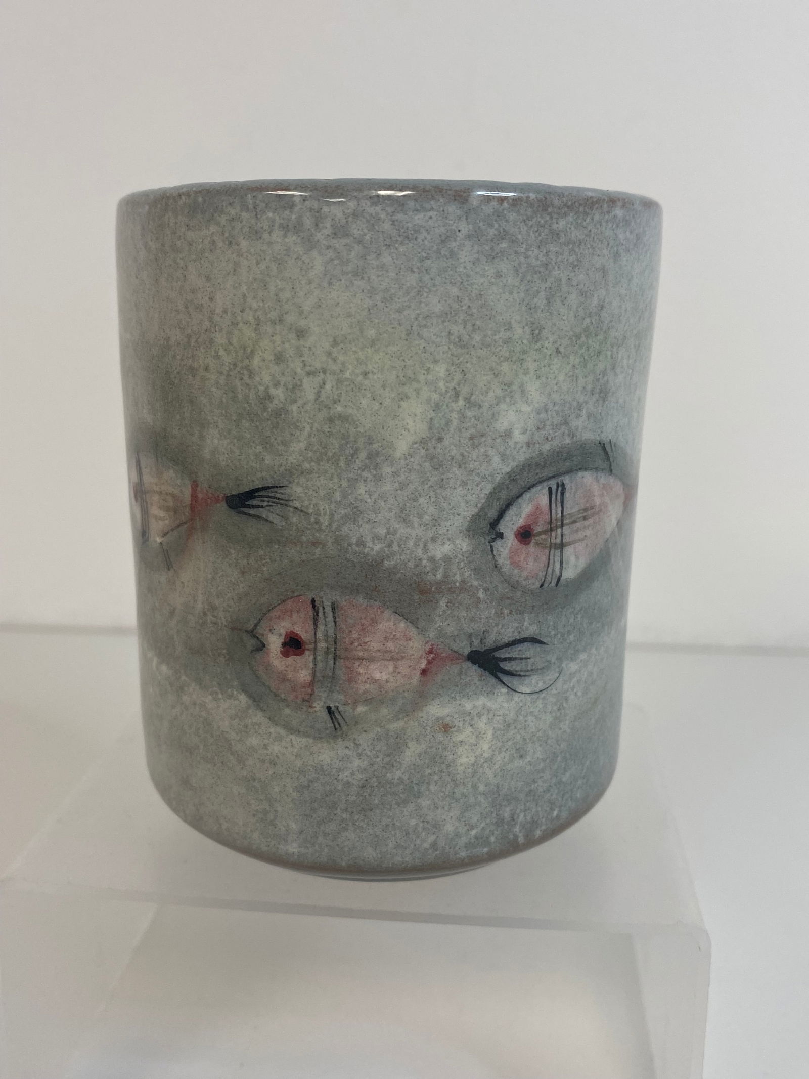 Pillin Pottery Fish: 7 fish swimming around the vase standing 4" tall