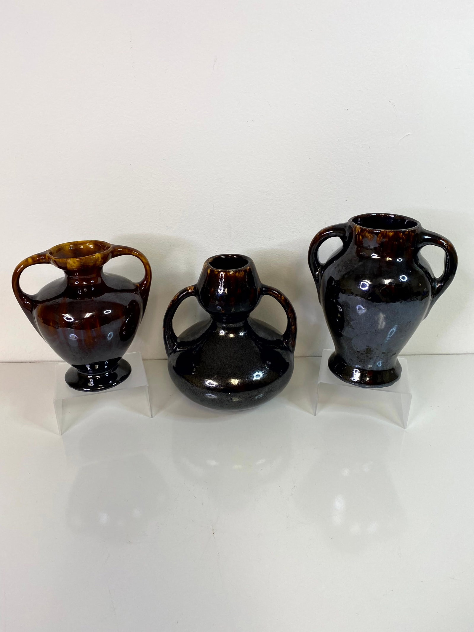 3 Rockingham Glazed Pcs: tallest is 7 1/4" smallest might be Florentine Pottery but not sure.