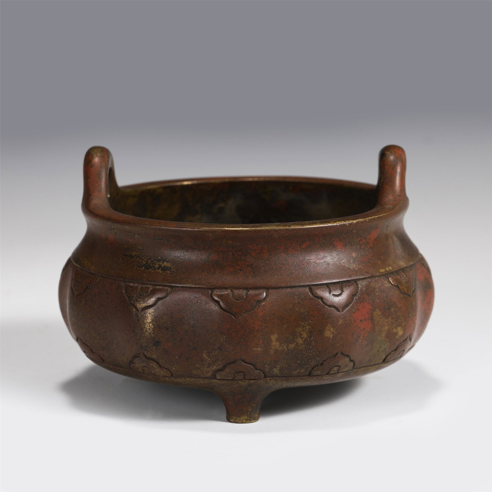 CHINESE DOUBLE HANDLE TRIPOD BRONZE CENSER: Dimensions: CHINESE DOUBLE HANDLE TRIPOD BRONZE CENSER 12 cm Diam x 7.5 cm H A chinese double handle tripod bronze censer .Made in The Year of Xuande Period of The Ming Dynasty. This statue is made of