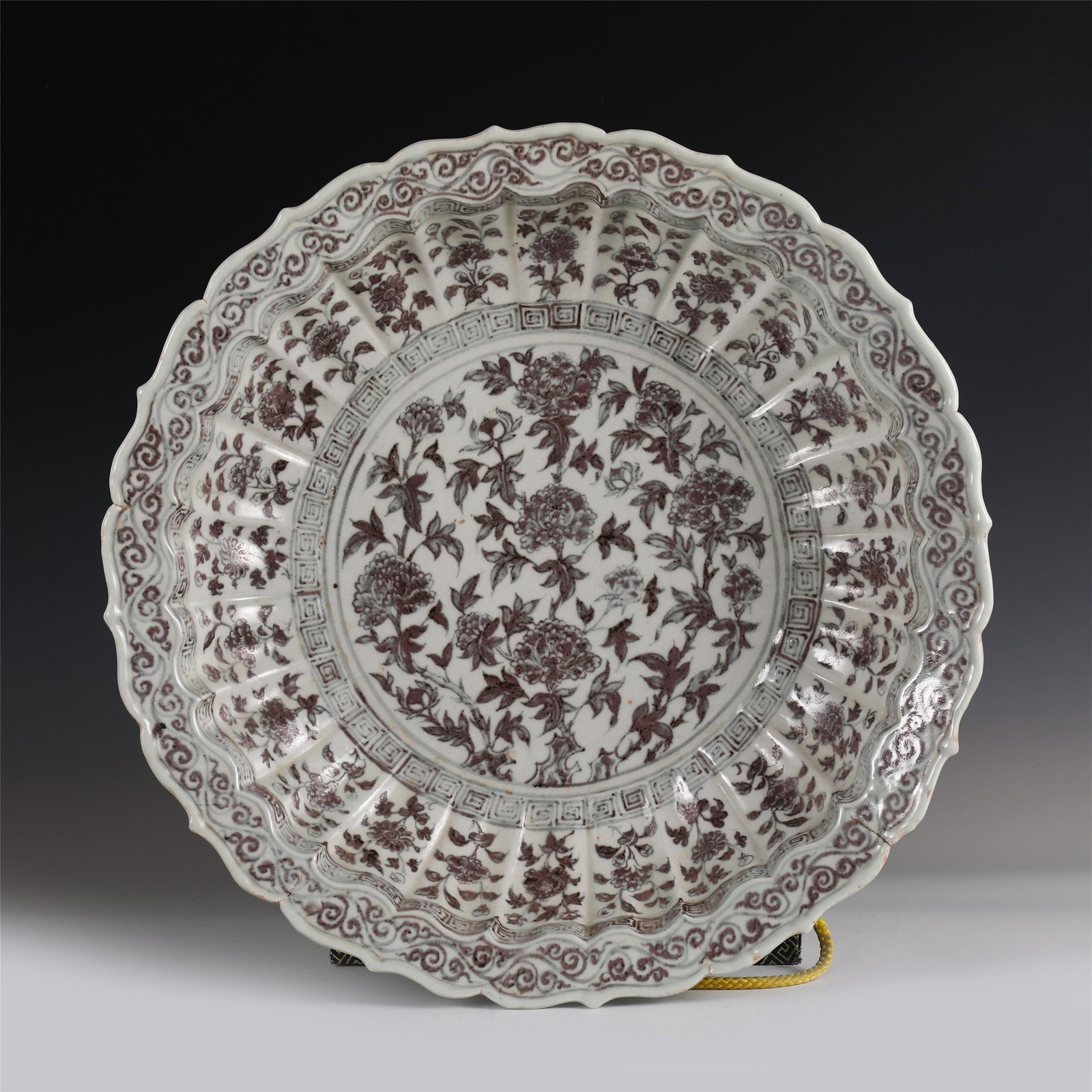 CHINESE RED UNDER GLAZE PORCELAIN PLATE WITH FLOWER: Dimensions: CHINESE RED UNDER GLAZE PORCELAIN PLATE WITH FLOWER PATTERN MING DYNASTY 45 cm Diam x 9 cm H Red undergaze porcelain plate of Ming Dynasty in China .This is a underglaze red design porcela