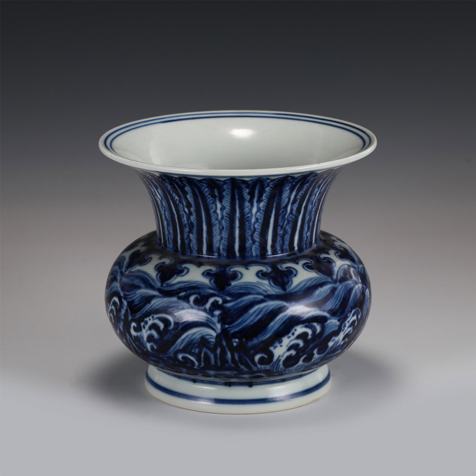 CHINESE BLUE AND WHITE PORCELAIN SPITTOON: Dimensions: CHINESE BLUE AND WHITE PORCELAIN SPITTOON 16 cm H x 17 cm Diam Chinese blue and white porcelain spittoon .Made in The Year of Xuande Period of The Ming Dynasty. This spittoon has regular v
