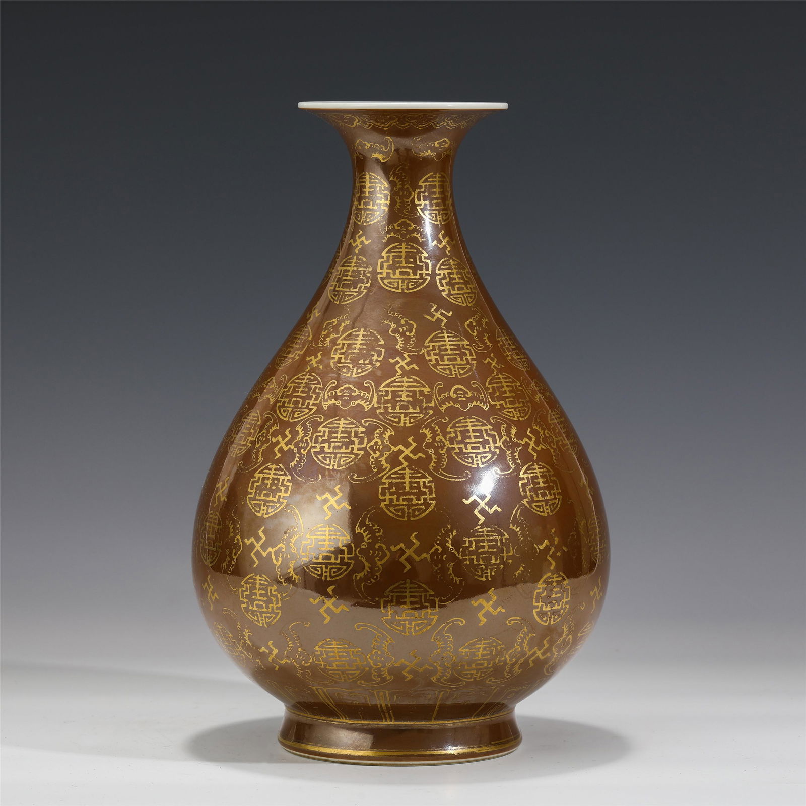 A CHINESE BROWN GLAZED GILT-DECORATED PORCELAIN VASE (1 of 8)