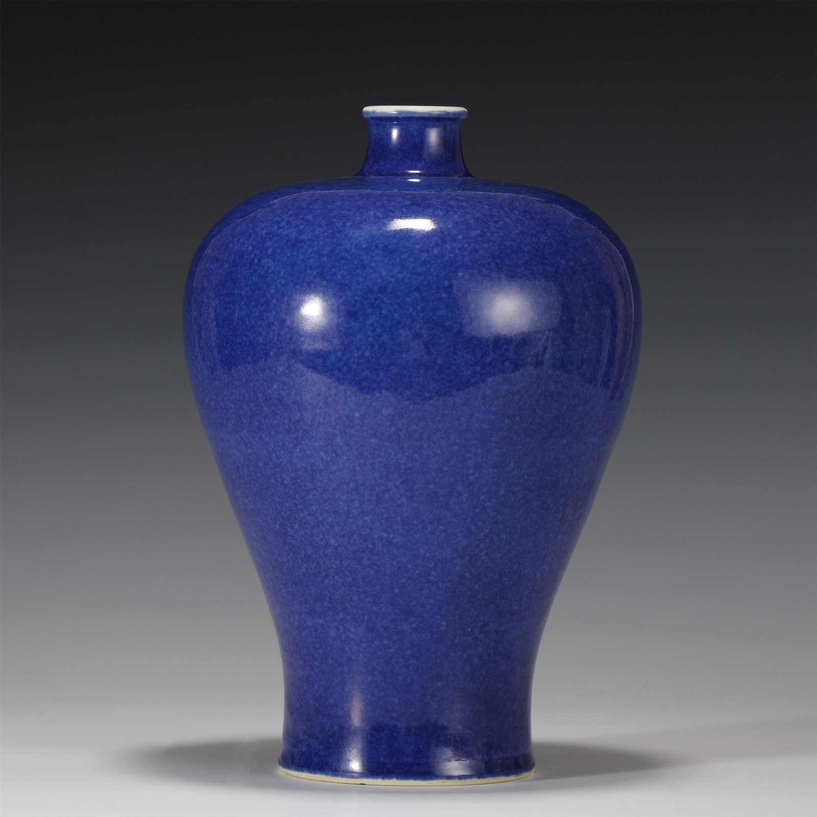 A CHINESE BLUE GLAZE PORCELAIN VASE: A CHINESE BLUE GLAZE PORCELAIN VASE 16 cm Diam x 24 cm H x Weight 1450 gram. The bottle is applied with Ji blue glaze as a whole. The glaze is thick and fat, with bright color, Ying run, quiet and ele