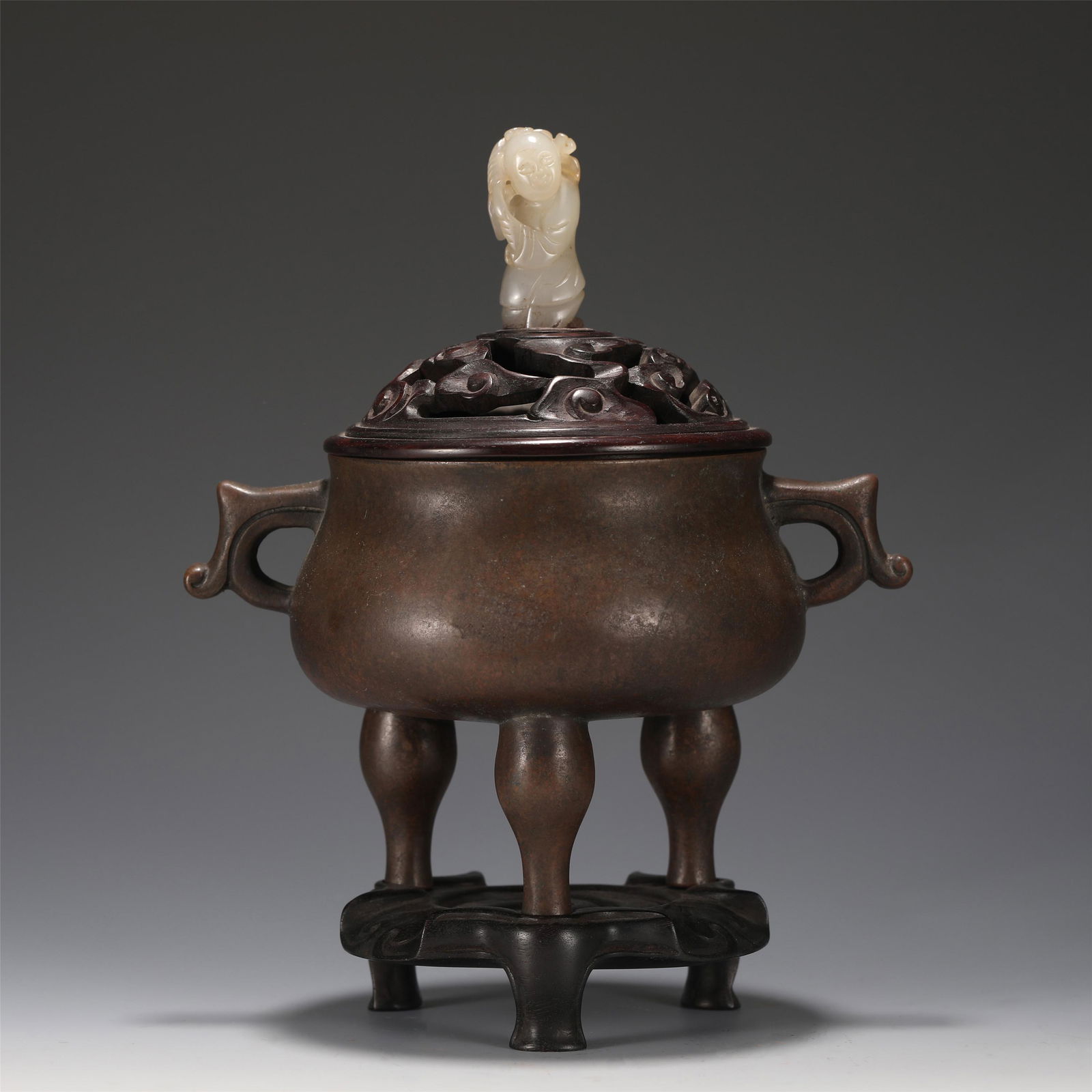 A CHINESE TRIPOD DOUBLE HANDLE BRONZE CENSER (1 of 10)