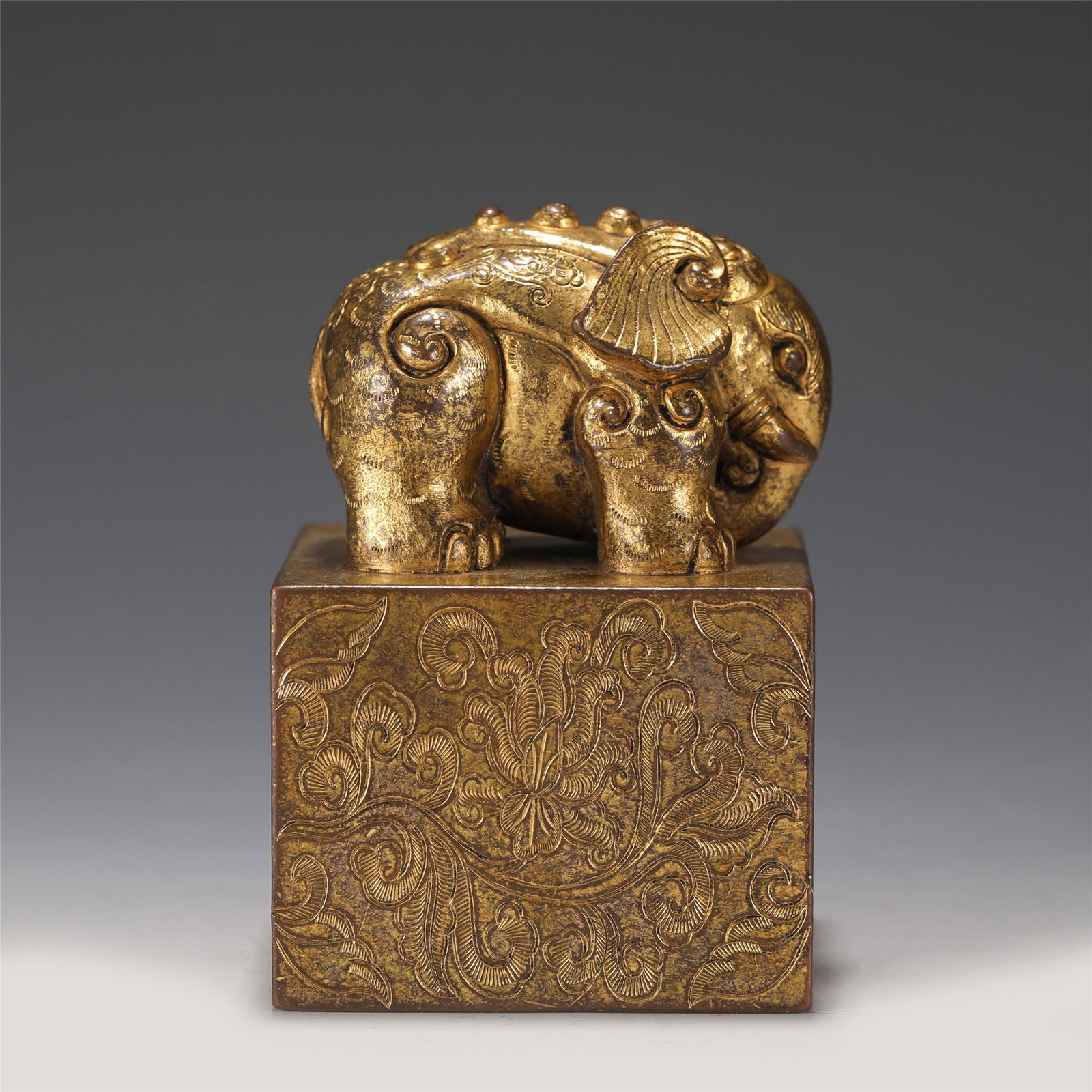 A CHINESE GILT BRONZE SEAL (1 of 9)