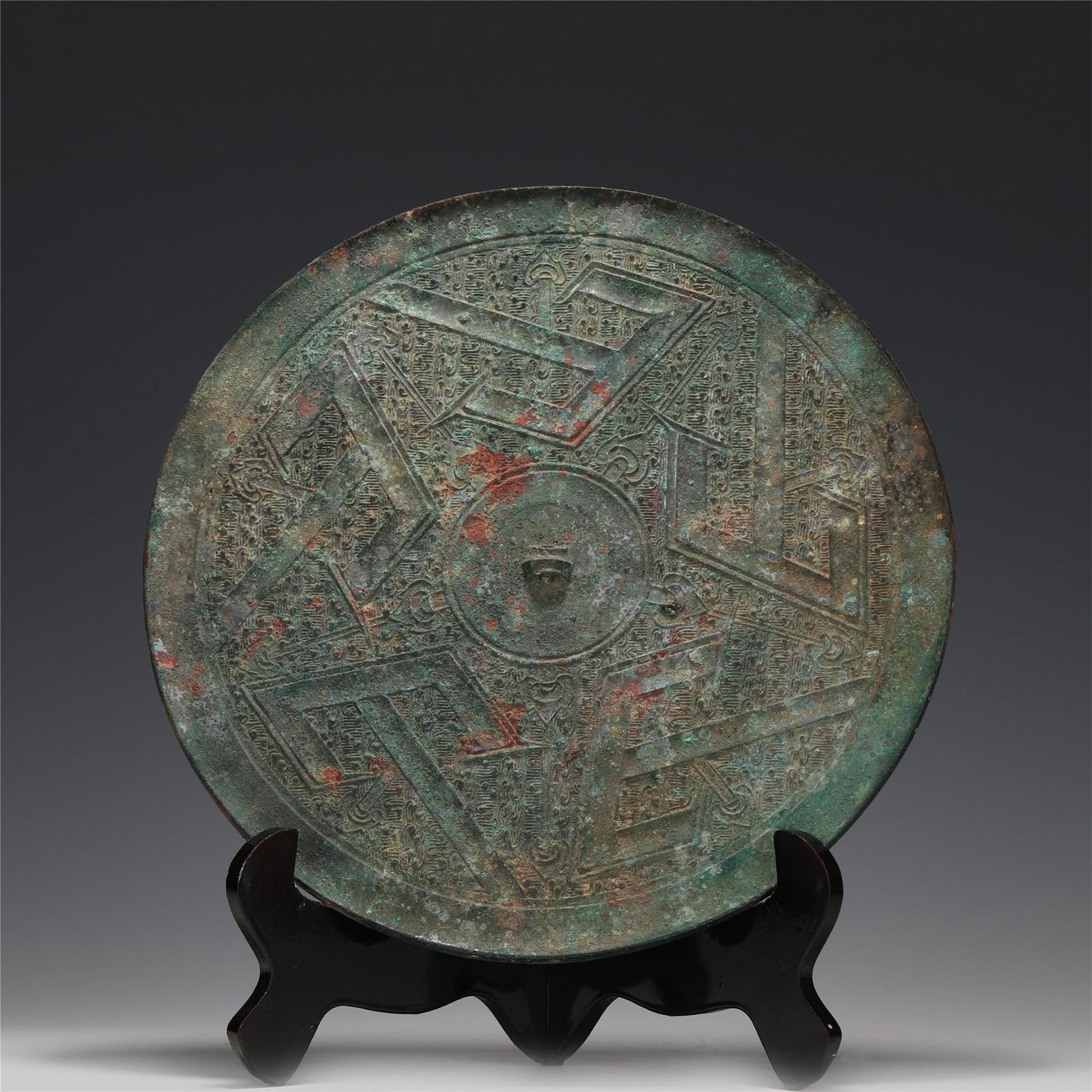 A CHINESE BRONZE MIRROR (1 of 9)