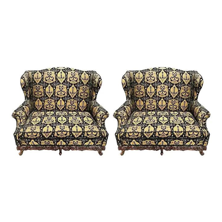 Rococo Style Settees, a Pair: 19th-early 20th century settees / canapes or loveseats in Rococo style having a fine Fabric. This is simply the finest pair of wonderfully covered and carved oversized settees or canapes anyone could