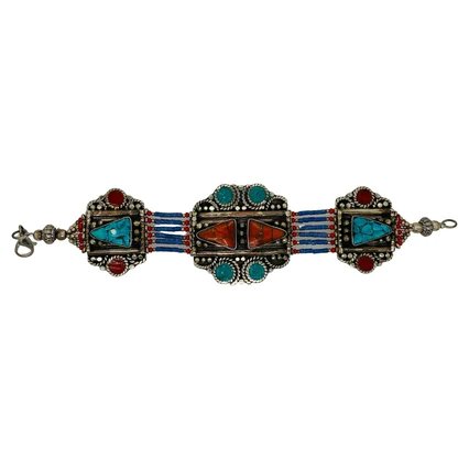 Moroccan Moorish Antique Silver Bracelet: A stunning handmade Moroccan Berber tribal pure silver bracelet. This beautiful and one of a kind piece of jewelry made around 1920's in the Atlas Mountains in Morocco features genuine turquoise store