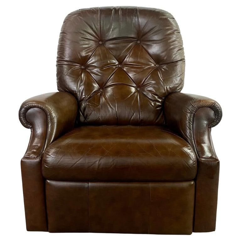 Mid-Century Brown Leather Tufted Reclining Club Chair: A Chesterfield style brown genuine leather Lazy boy reclining club chair. The classic and elegant club chair features tufted design and made of high quality brown leather. The club chair converts to a