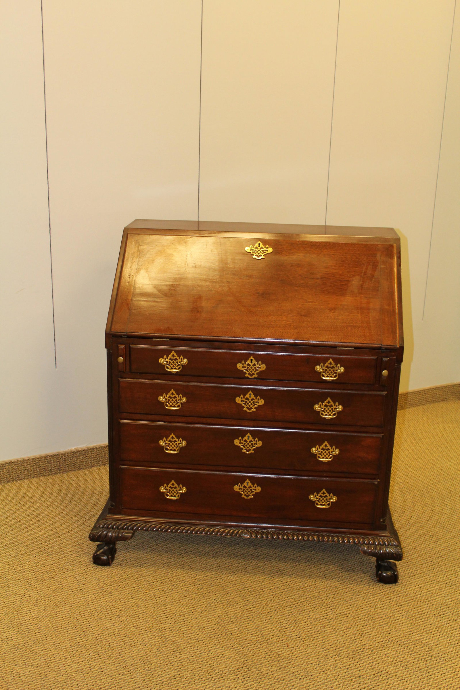 Chippendale style carved mahogany slant front desk: CONDITION NOTES: MEASUREMENTS: 43" x 22" x 36"
