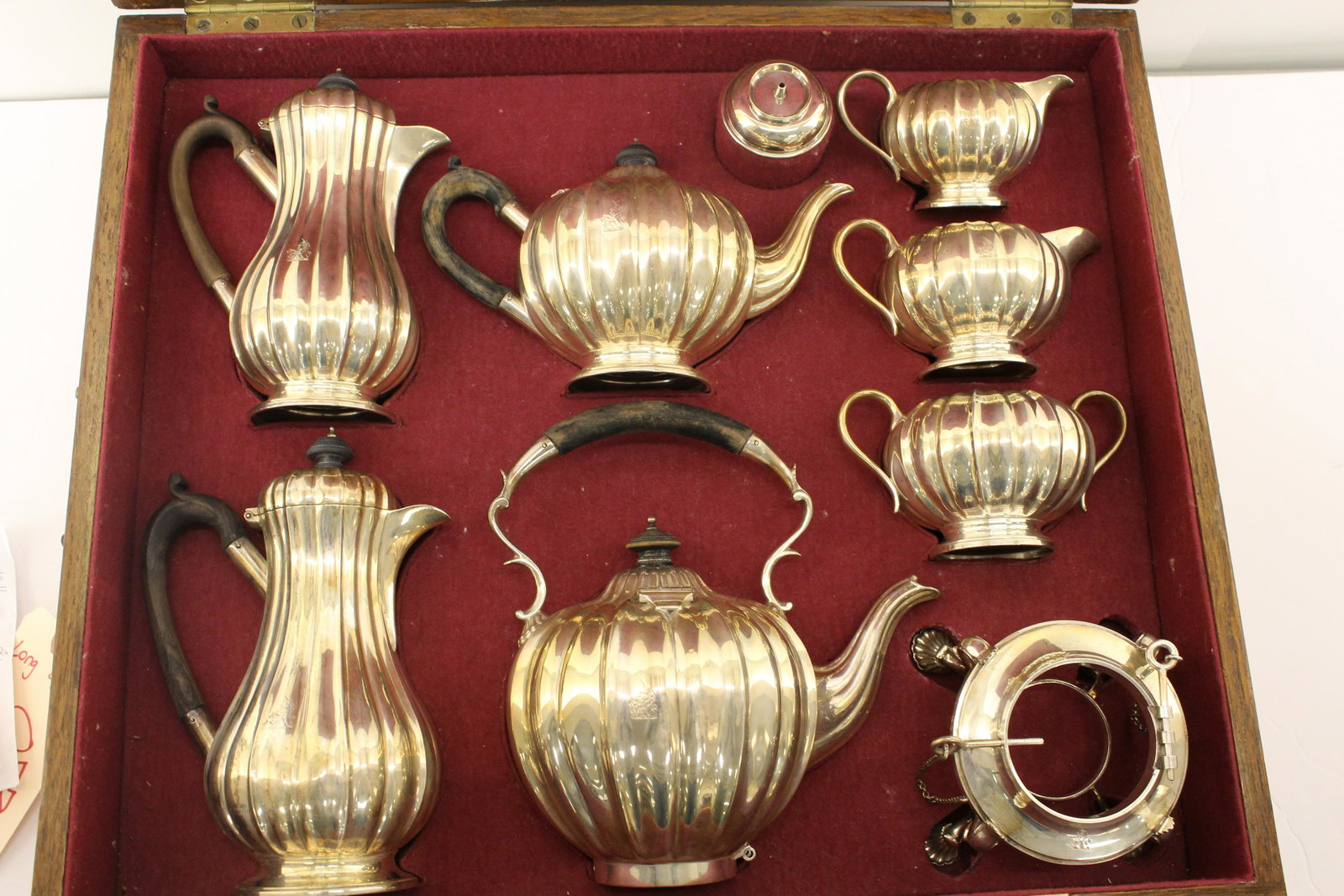 English Edwardian Sterling Silver 9 Piece Coffee Tea: HOLLAND, ALDWINCKLE & SLATER, London 1902; 96.3oz; melon form, ebony handles