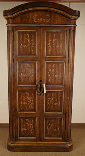 Renaissance Style Two Door Armoire: 20thC; Retailed at Woodward & Lothrop, DC; Painted decoration; interior is fitted with shelves and drawers