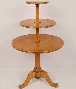 Biedermeier 3-Tier Pedestal Table: 3 Graduated trays supported by a center column; raised on a tripod base. Bird's eye maple and ebonized veneer. Property of Ambassador Stuart Bernstein