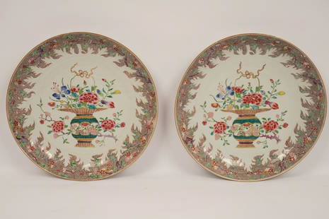 Pair Chinese Famille Rose Porcelain Bowls: Each decorated with a floral border centering a vase of flowers. Property of Ambassador Stuart Bernstein