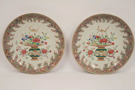 Pair Chinese Famille Rose Porcelain Bowls: Each decorated with a floral border centering a vase of flowers. Property of Ambassador Stuart Bernstein