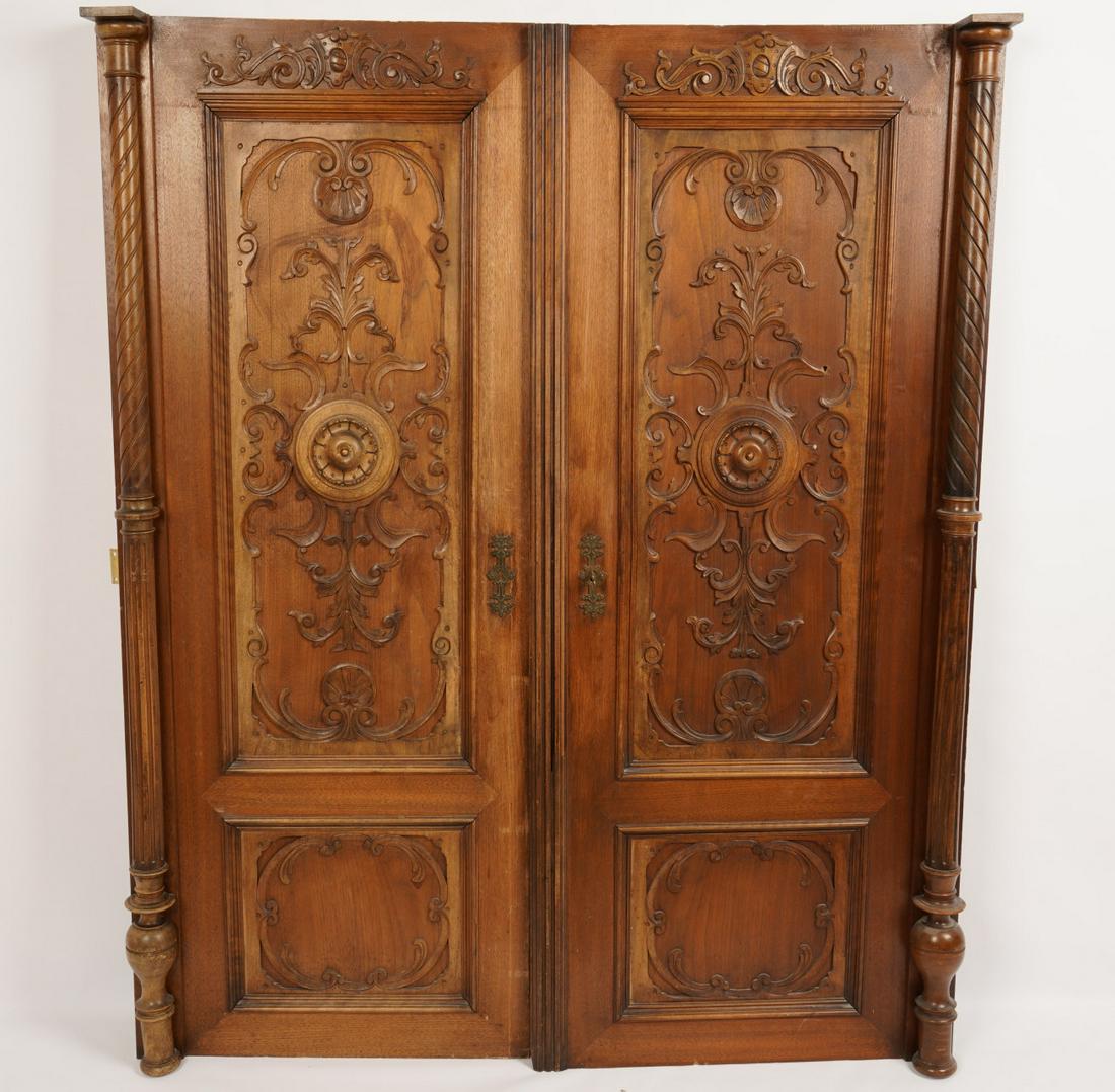 Pair Renaissance Style Carved Wood Panels: Formerly armoire doors; applied and carved decoration; measurement is for each panel