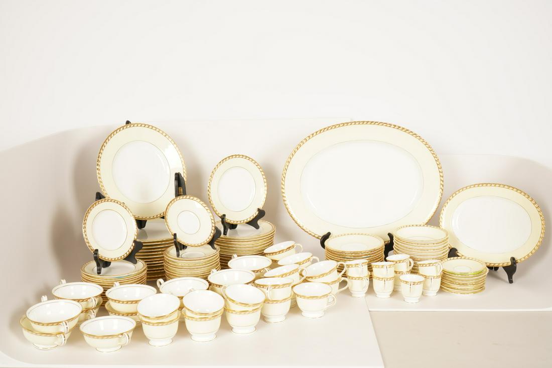 130 Piece Minton Porcelain Dinner Service: Commodore pattern. 14 Dinner plates 10.5"; 14 salad plates; 14 bread plates; 12 berry bowls, 13 bouillon cups/saucers, 9 demitasse cups/saucers, 17 coffee cups/saucers, 2 graduated platters