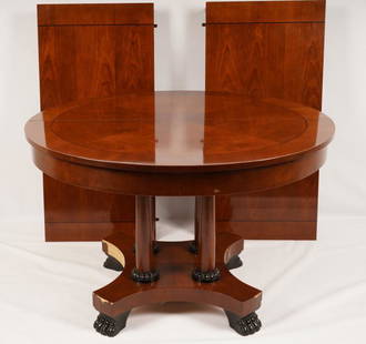 Empire Style Baker Ext. Dining Table: 2 leaves 22 inches each; Circular Top over columnar base, raised on paw feet