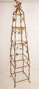 Gilt Metal Etegere: Contemporary period in the shape of a vine and twig entwined obelisk; includes four pieces of glass.