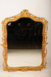 Gilt Frame Acorn Mirror: Baroque form centered among a continuous oak leaf and acorn decoration. Beveled glass. Retailed through Majestic Mirror