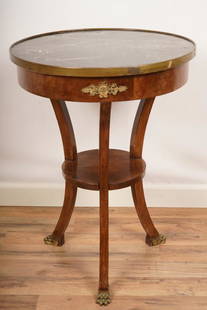 French Empire Style Marble Top Gueridon: In the Empire taste, round marble top over a concave pedestal base.