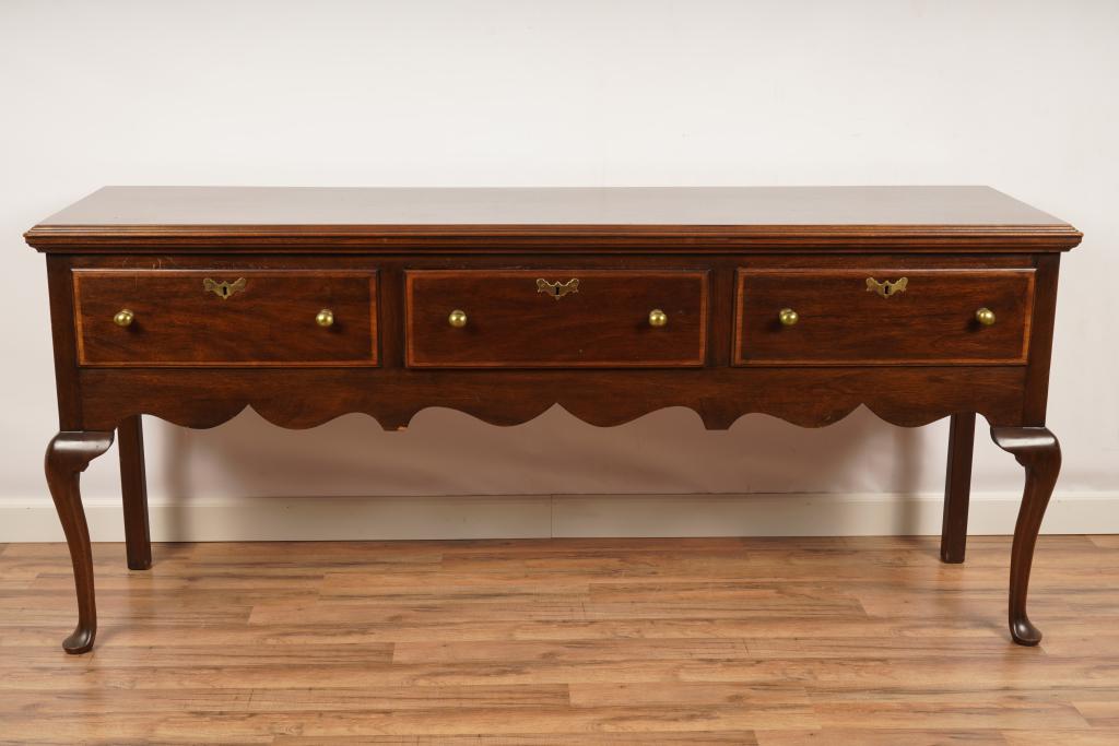 Henkel Harris Queen Anne Sideboard: Of typical rectangular form with three drawers and cabriole legs