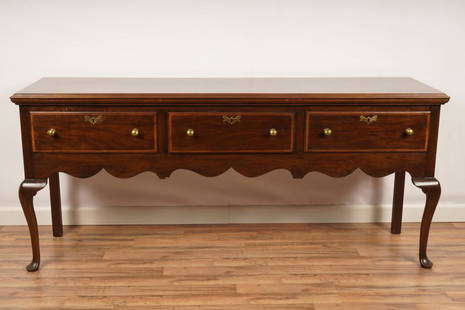 Henkel Harris Queen Anne Sideboard: Of typical rectangular form with three drawers and cabriole legs