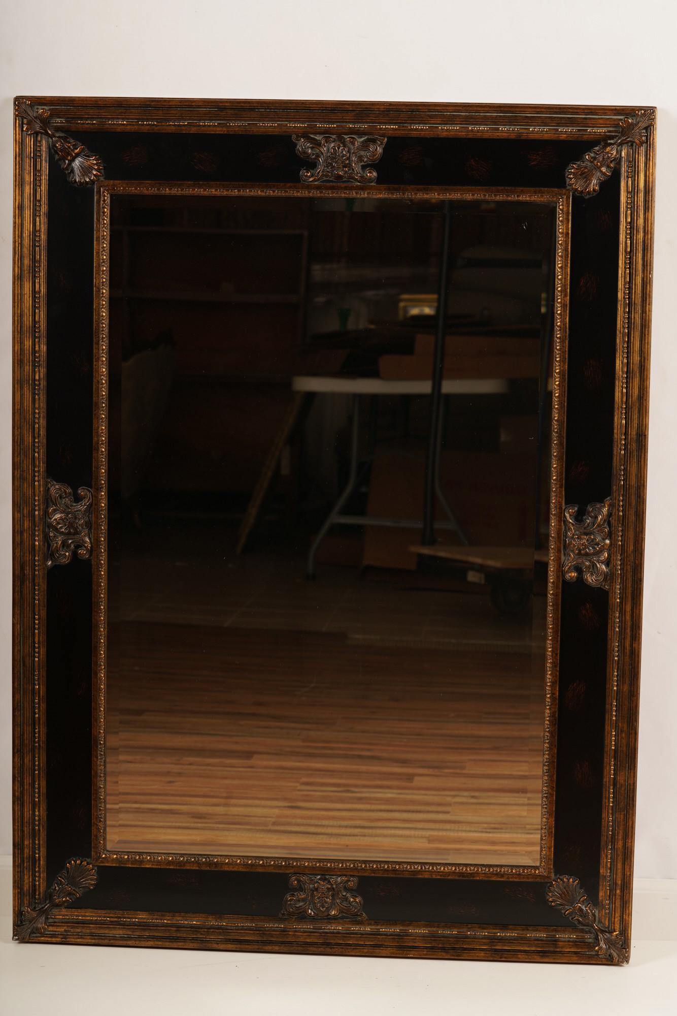 Uttermost French Provincial Style Ebonized Mirror: One (1) mirror with black antique style frame by Uttermost. H 45 1/2" x W 33 3/4"