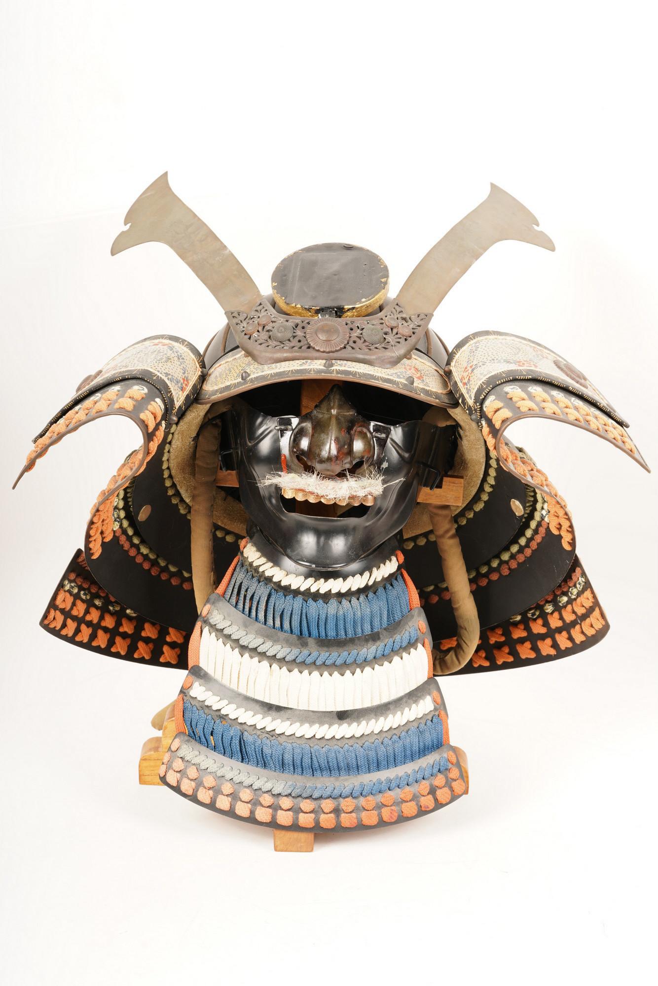 Japanese Samurai Headress on Stand: H 20” x W 17” x D 12” The net proceeds from this lot benefit womenâ€™s charities.