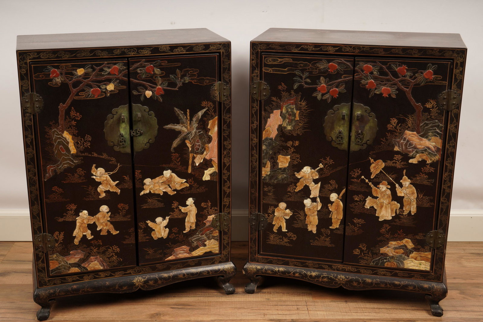 Pair Chinese Lacquered Speciman Mounted Cabinets: H 27.25” x W 20.75”x D 11” The net proceeds from this lot benefit womenâ€™s charities.