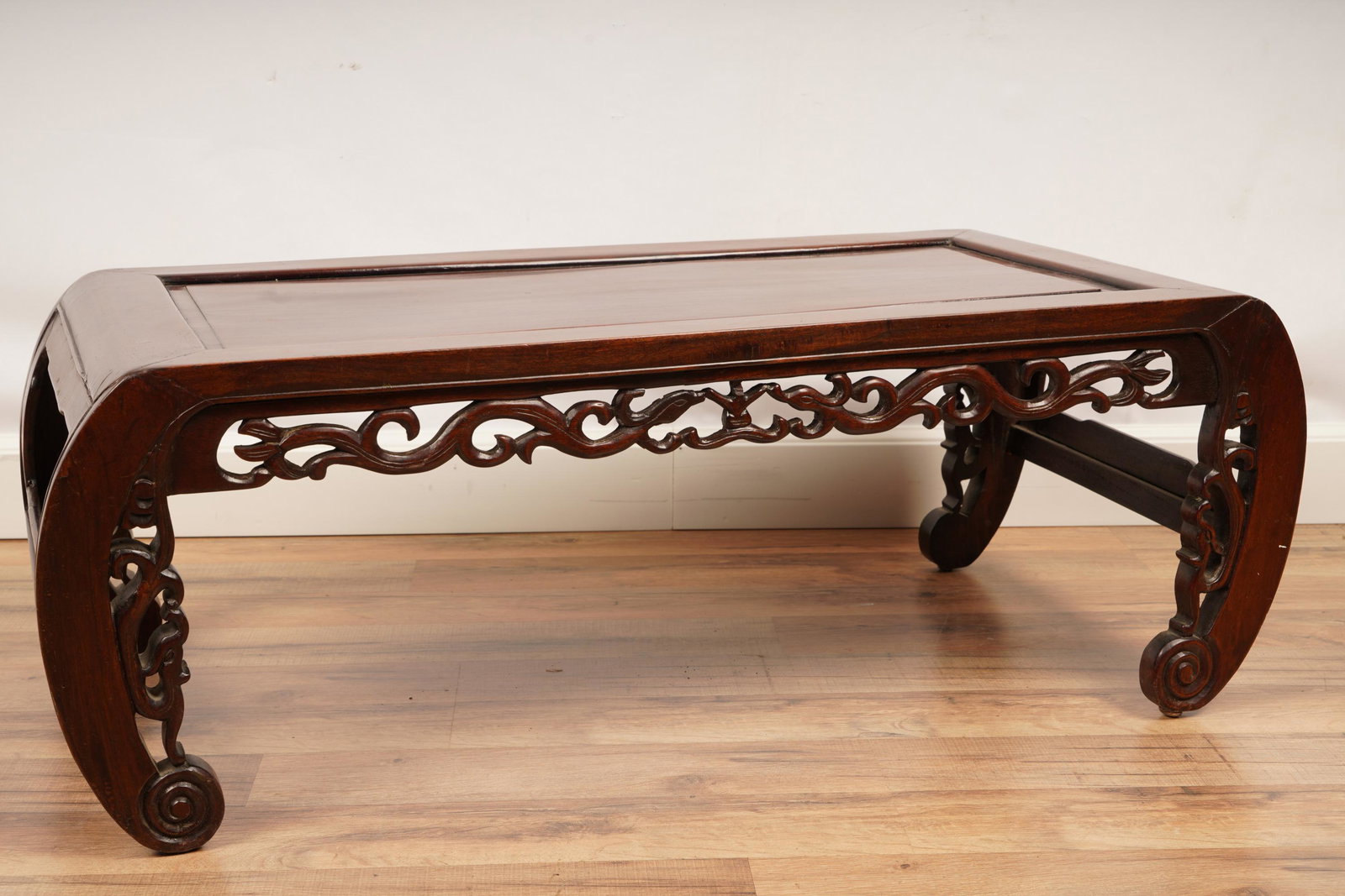 Chinese Carved Wood Low Stool: H 13” x W 36” x D 17” The net proceeds from this lot benefit womenâ€™s charities.