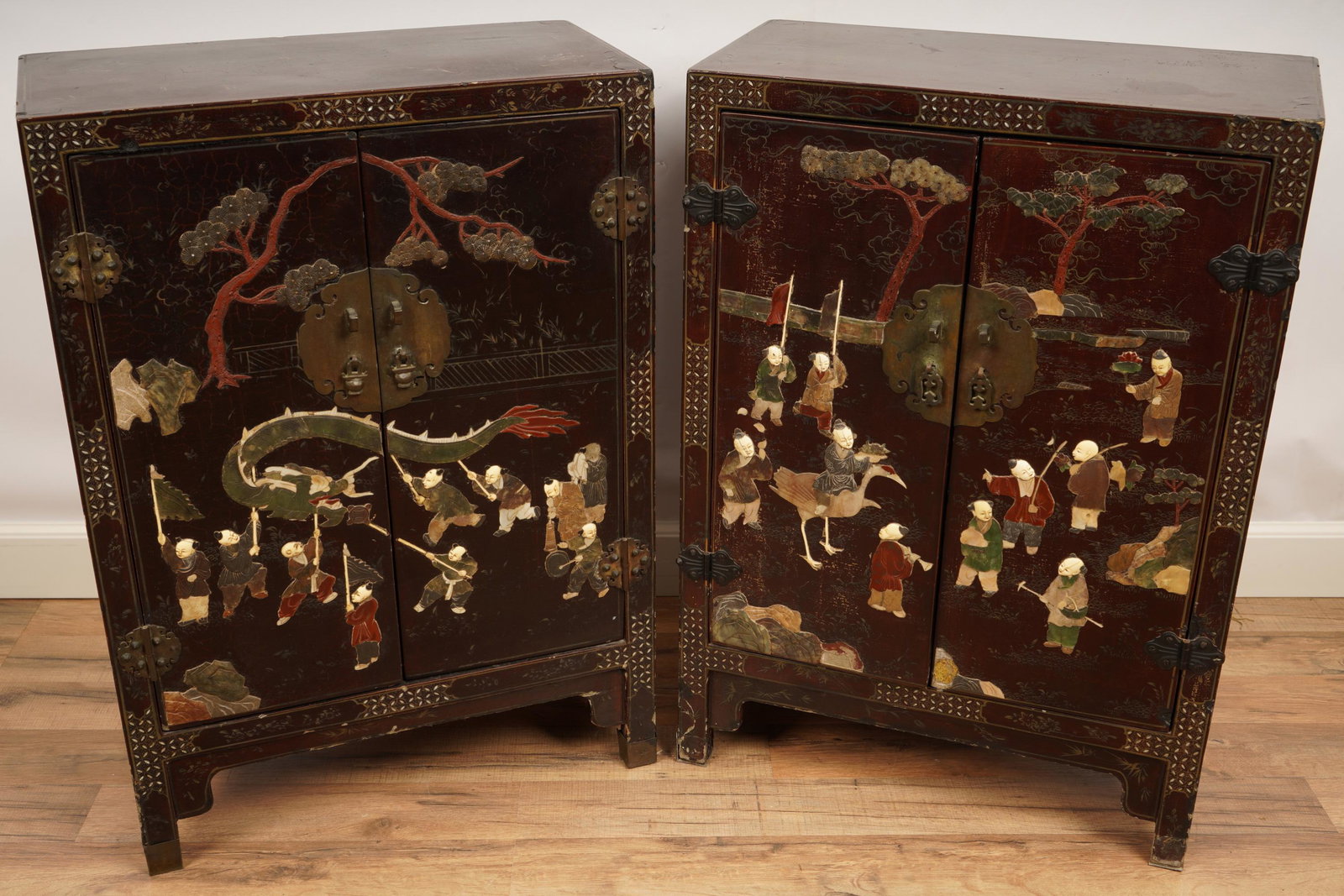 Pair Chinese Lacquered Speciman Mounted Cabinets: H 29.75” x W 21” x D 10.5” The net proceeds from this lot benefit womenâ€™s charities.