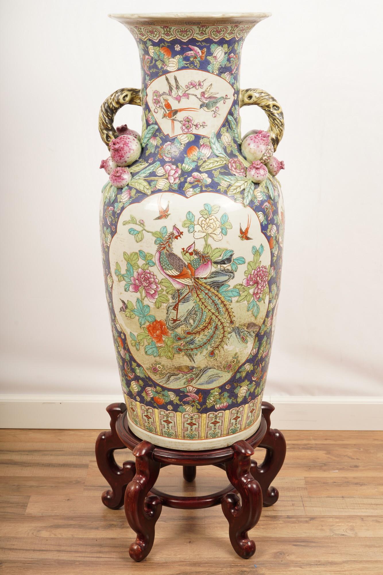 Large Chinese Famille Rose Porcelain Vase on Stand: H 37” x D 17” The net proceeds from this lot benefit womenâ€™s charities.