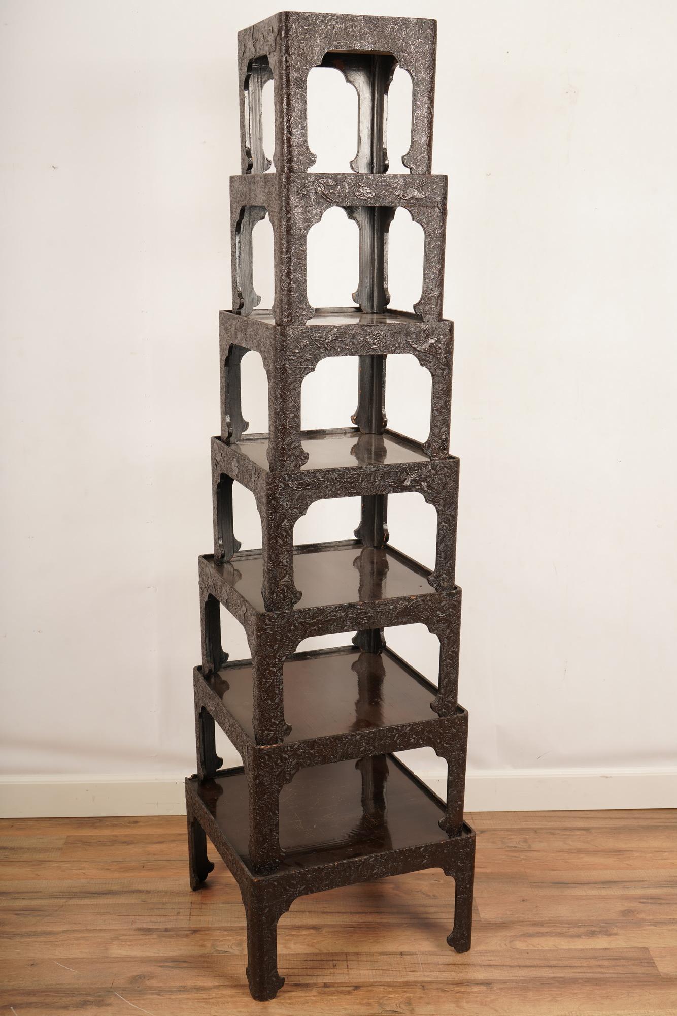 Fine Chinese carved 7 tier stacking tables: H 67” x W 18” x D 18” The net proceeds from this lot benefit womenâ€™s charities.