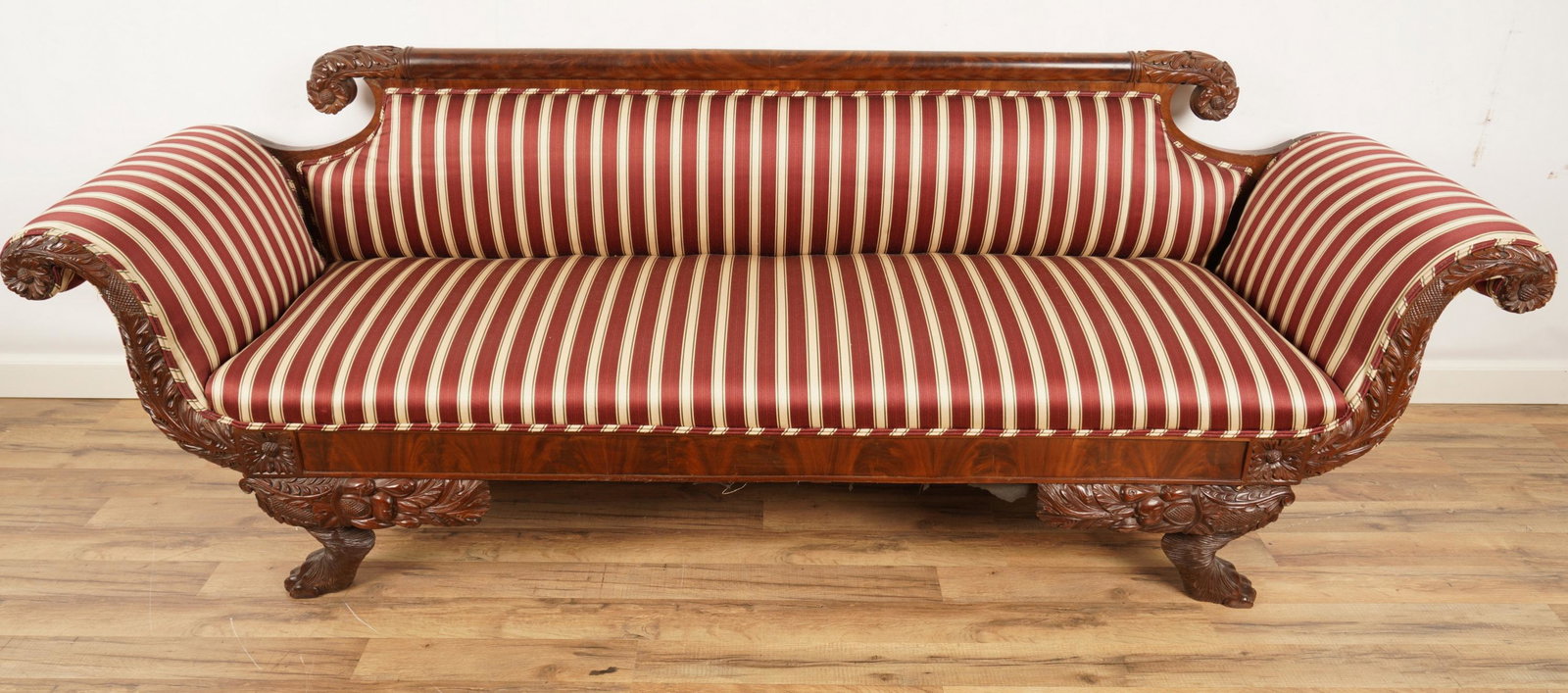 American 19thC Neoclassical Upholstered Sofa: H 33” x W 93” x D 35” The net proceeds from this lot benefit womenâ€™s charities.