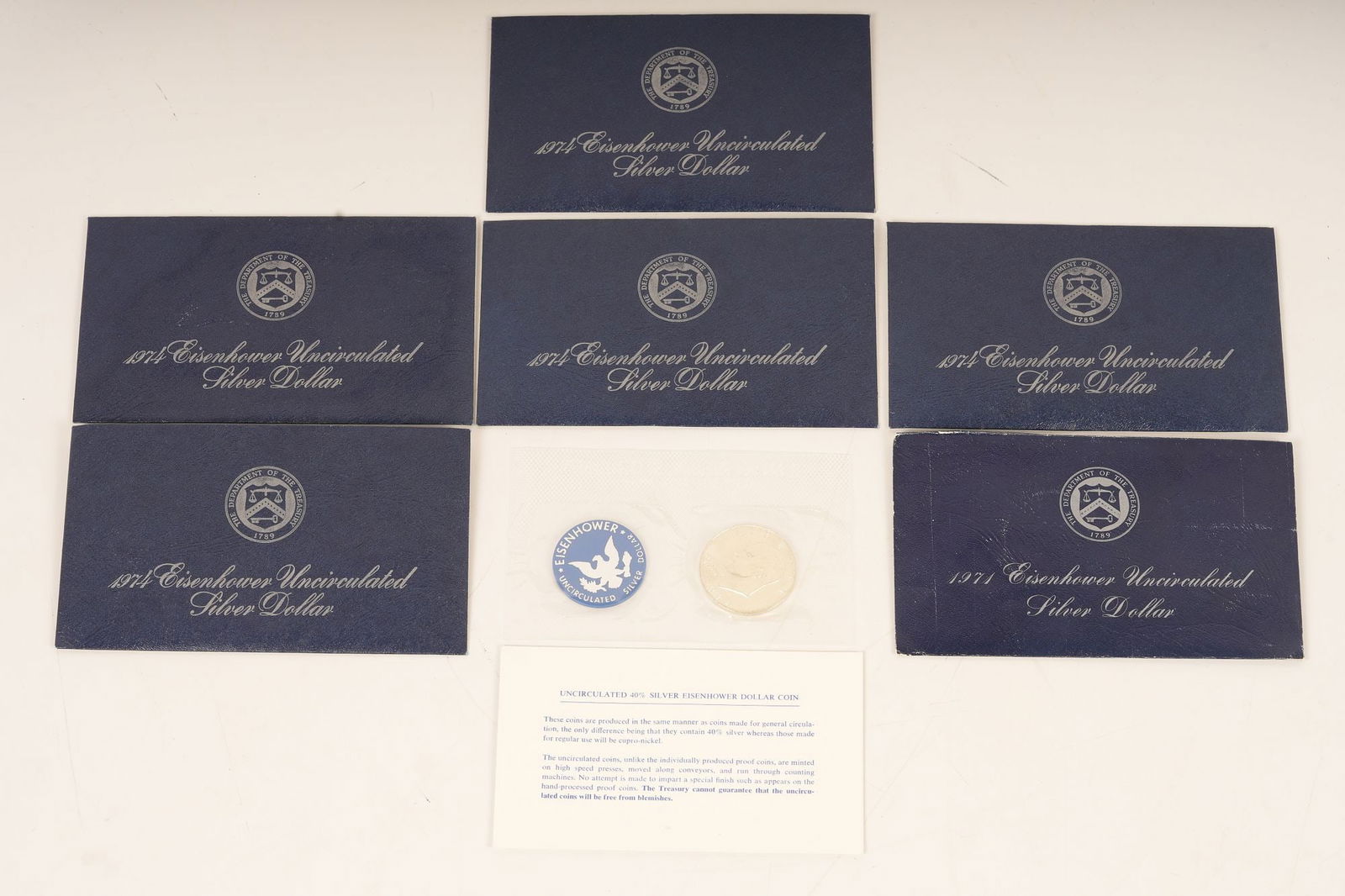 6 1971-1974 Uncirculated Eisenhower Silver Dollar (1 of 4)