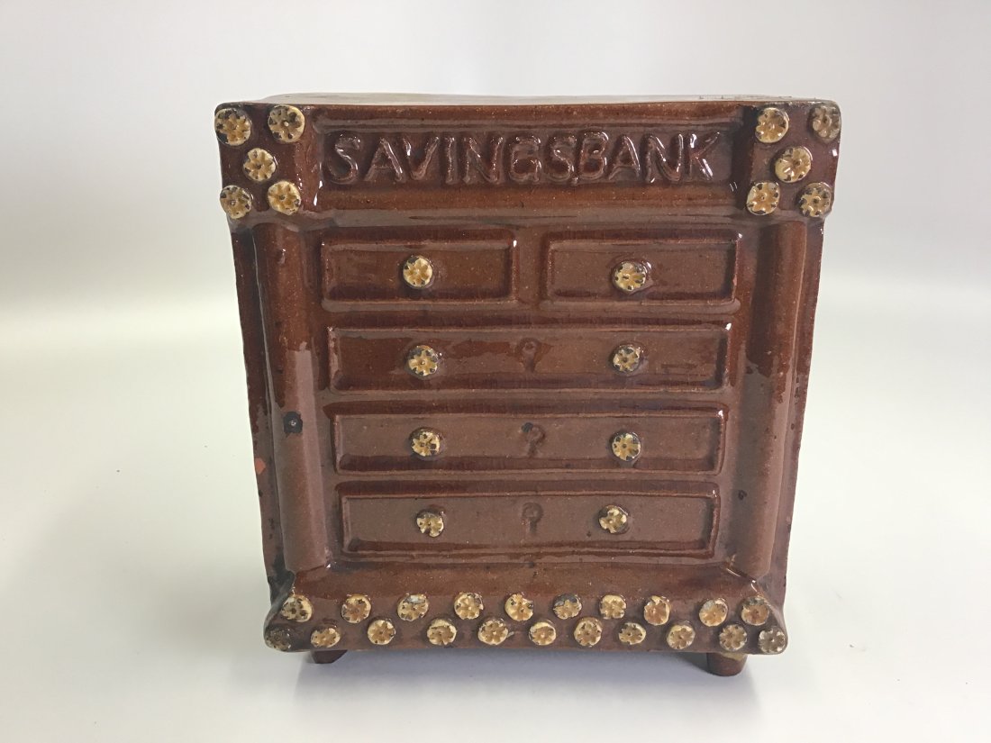A Late 19th Century Burton in Lonsdale Earthenware Chest Firm Money Box: In excellent condition with minor surface wear. Some loss around money hole.
