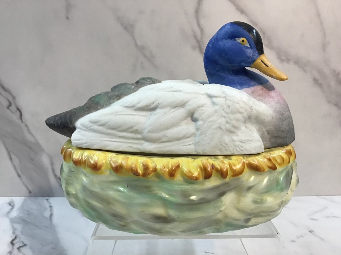 English Staffordshire Duck on Nest: Lid is painted bisque over a conforming glazed base.